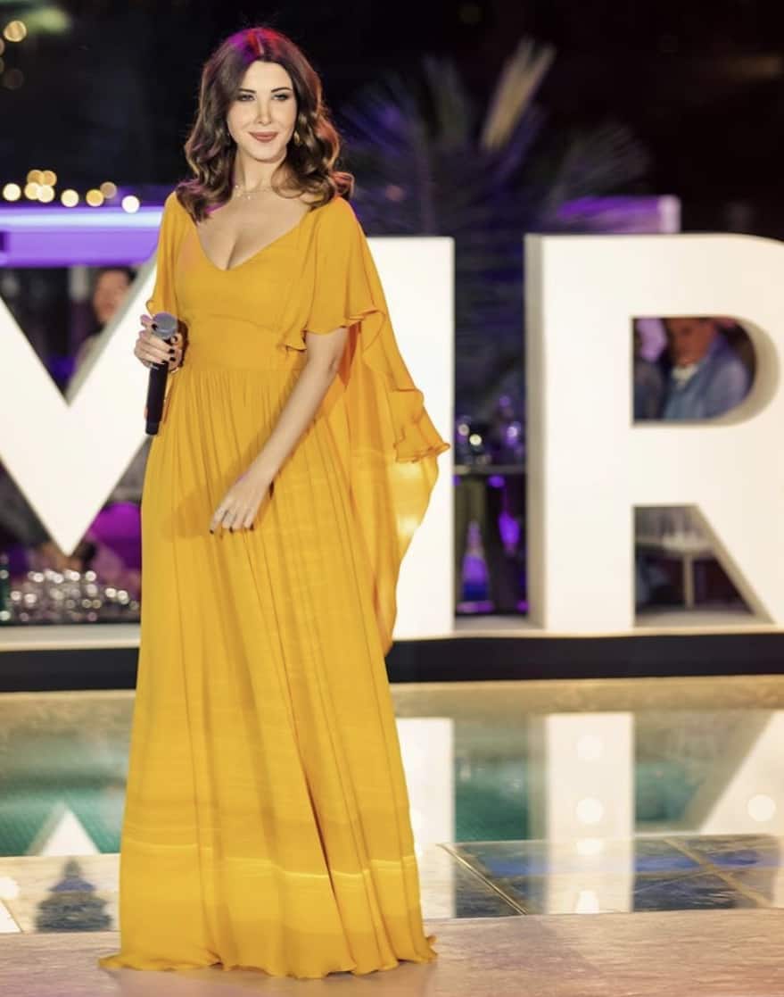 Nancy Ajram in Dubai shines in yellow