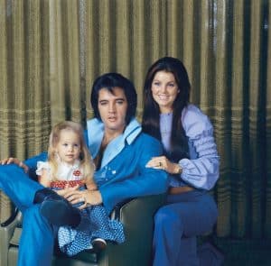 Elvis Presley with his wife and daughter